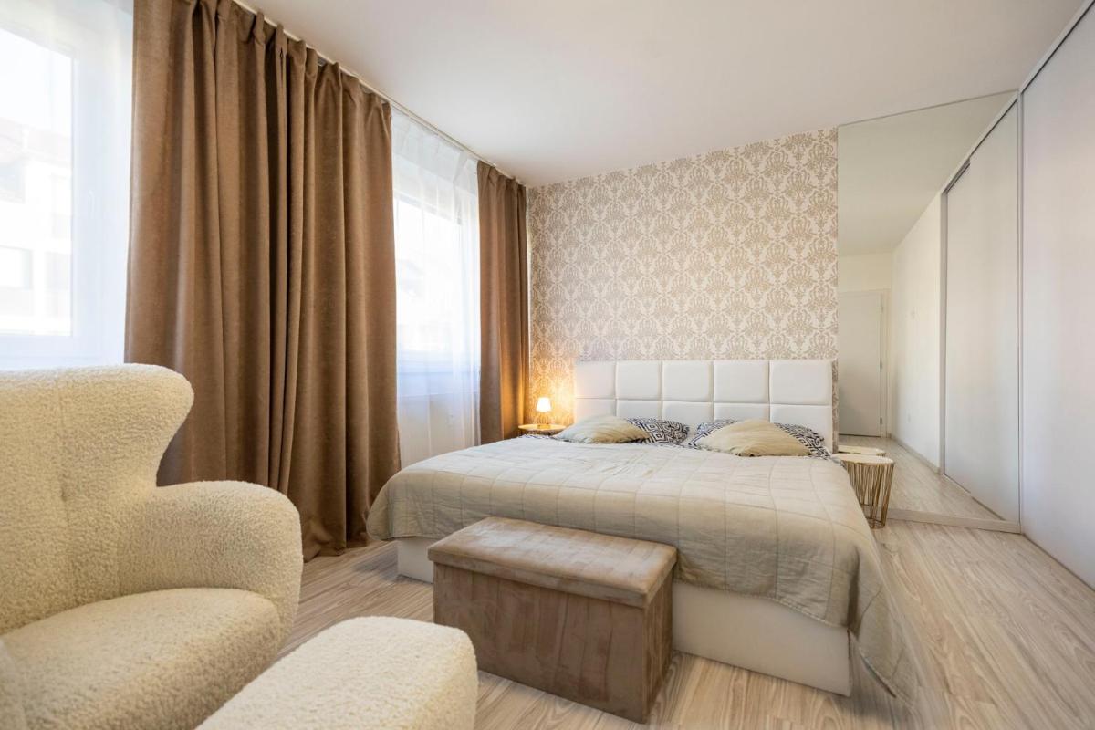 Image 3 of ALURE RESIDENCES 13 & 24h self check-in, fireplace,private parking in front of the apartment building included, new building, green area with meadows and forests