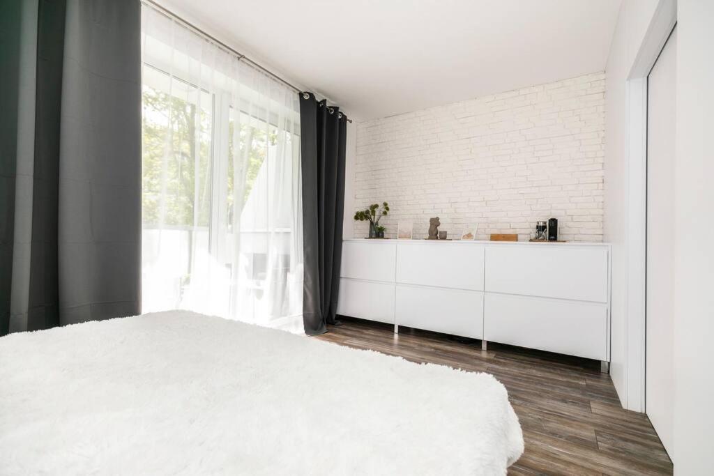 Image 2 of ALURE RESIDENCES 1 & 24h self check-in, free parking in front of the apartment building, new building, terrace, cafe with breakfast in the apartment building, next to the aqua park
