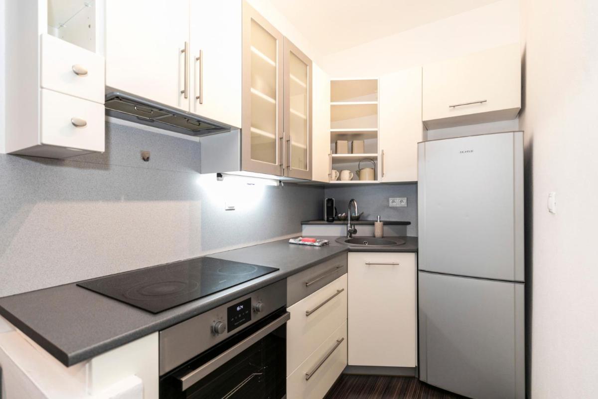 Image 4 of ALURE RESIDENCES 3 & 24h self check-in, parking in the garage in the apartment building included, new building, terrace, green location with a forest park with a lake, children’s playground