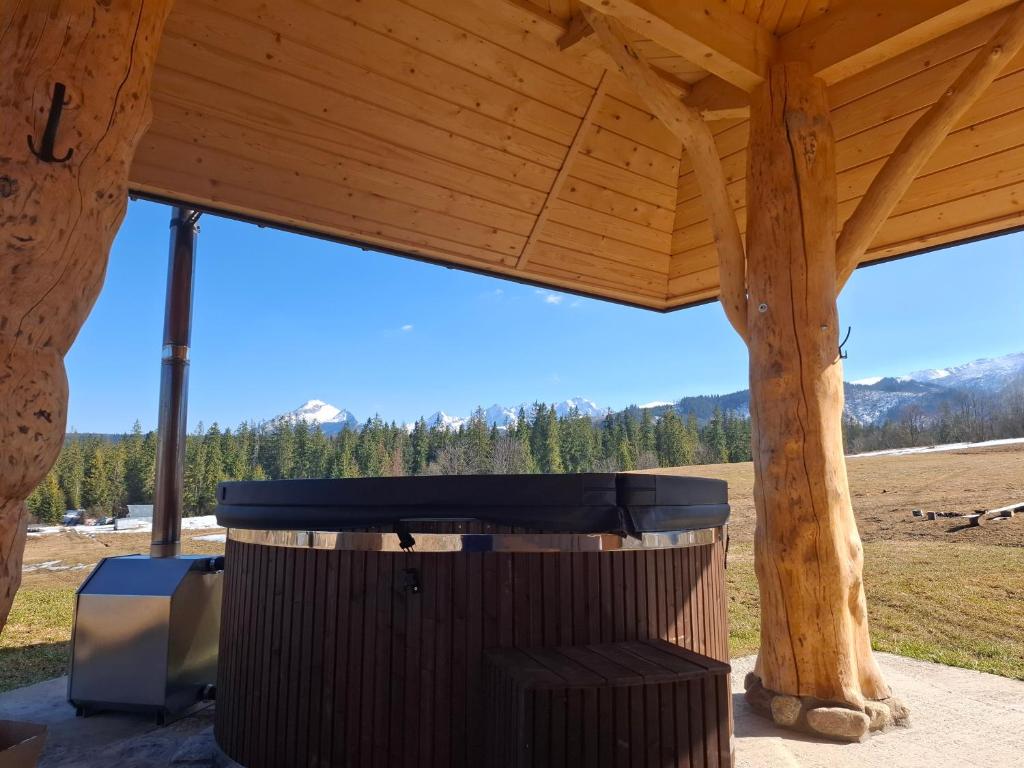 Image 1 of Domek Na Przełęczy wood house & mountain view & JACUZZI – balia ogrodowa